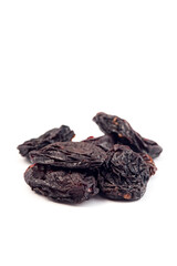Dried prunes on a white background. Dried fruits.