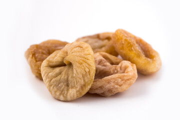 Dried figs on a white background. Dried fruit.