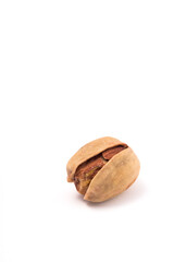 Pistachios nuts over white background. Healthy food concept.