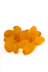 golden raisins isolated on white background. close up.