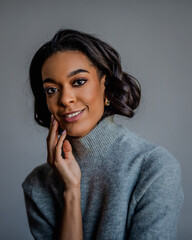 Close-up of an african american female portrait against gray background