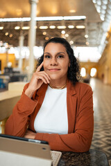 Confident African American businesswoman working in modern marketplace. Professional woman in...