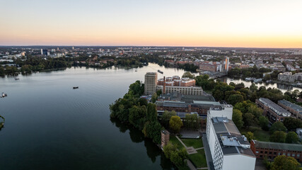 drone aerial view over Spandau Berlin in Germany over river HAvel on a sunny summer evening with...