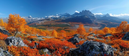 Naklejka premium Majestic Mountain Landscape with Autumnal Colors