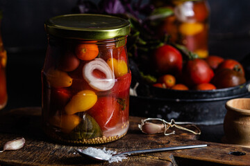 Pickled cherry tomatoes in a jar