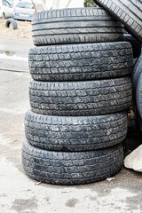 Stacked Tires on Asphalt