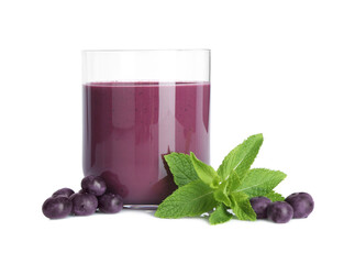 Tasty acai juice in glass, mint and berries isolated on white