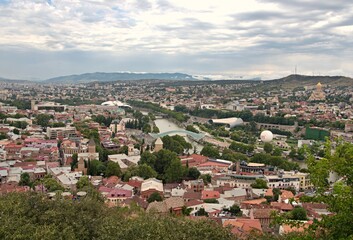 Naklejka premium Panorama of Tblisi, Georgia, on a cloudy day 
