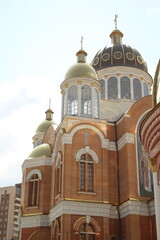 KYIV, UKRAINE Ukrainian Orthodox Church in honor of the Intercession of the Mother of God in kyiv, with its orthodox cross golden cupolas