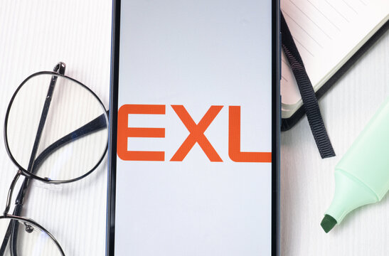 New York, USA - 1 August 2024: EXL Service Logo on Phone Screen, Company Icon on Display