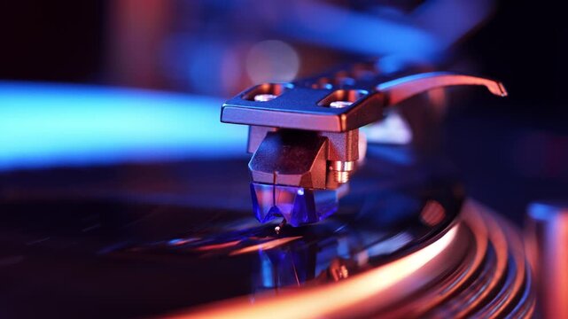 Spinning record in colorful led light on vinyl player. Close-up view. Vivid movie under neon. Analog audio equipment concept, vintage party. High quality 4k footage