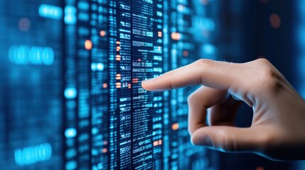 Close-up of a hand interacting with digital data on a screen, representing technology, data analysis, and cybersecurity concepts.