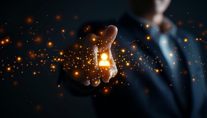 A businessman holds out his hand with a glowing human icon, surrounded by sparks, symbolizing connection and leadership.