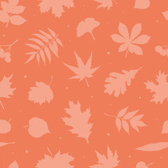 Autumn seamless pattern with falling leaves silhouettes on orange background. Good for wallpaper, textile prints, scrapbooking, wrapping paper, backgrounds, banners, etc. EPS 10