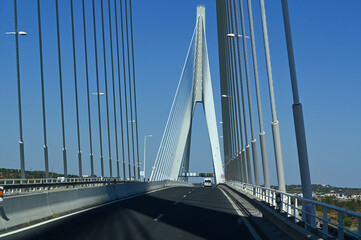 Fototapeta premium Modern cable bridge over the river in Portugal.