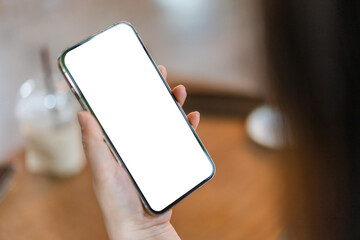 Human working on modern smartphone with blank white mobile screen for advertising, mockup, technology, advertising, search information, creative design, social media, online marketing, chat, phone