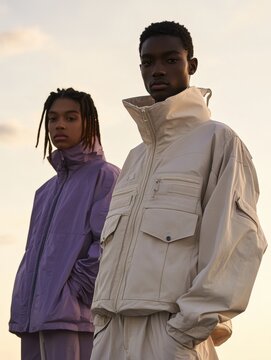 A streetwear fashion campaign, African American male models and jackets, sky background