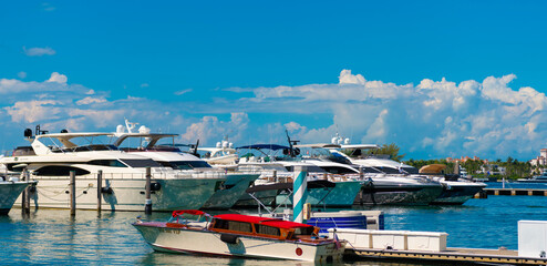 Luxury yacht boat moored at harbor pier in Miami beach summer marina, Florida