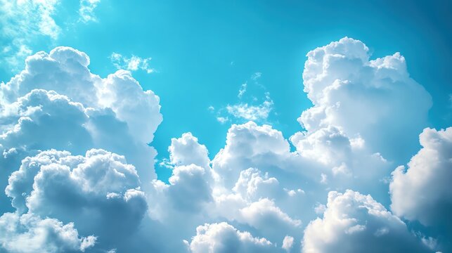 A serene and bright sky filled with fluffy clouds, creating a peaceful atmosphere in a sunny setting.