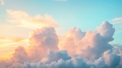A serene sunset sky with soft, fluffy clouds in pastel colors. Perfect for conveying calmness and tranquility in various designs.
