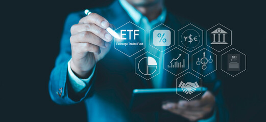 Investment Concept, Businessman with ETF icons, Exchange traded fund stock market trading investment financial, financial and investment, and interest rates, Stock market index fund