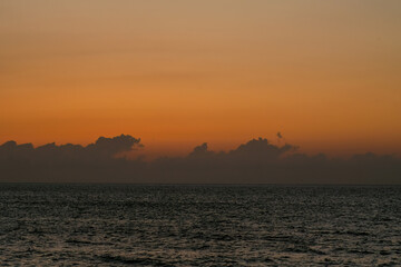 Naklejka premium 夕日と雲