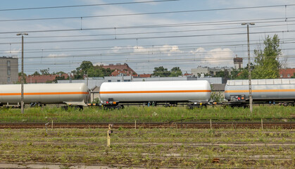 Gas tanker cargo wagon, freight train, gas tanks on the railway, railroad, side view, gas fuel transportation, industrial fuel oil transport, dangerous flammable materials, gas crisis concept, nobody