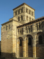Fototapeta premium Abbey of Saint-Austremoine. 12th century. UNESCO World Heritage. View of the north facade and the bell tower. Historic city of Issoire. Auvergne. France. 