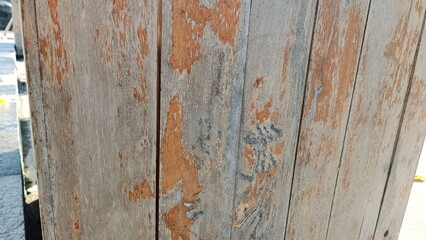 A wooden surface with a lot of scratches and dents
