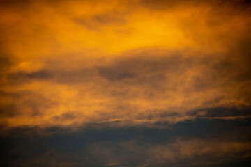 Abstract image created by the setting sun and clouds