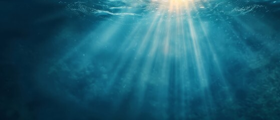 Fototapeta premium An underwater scene with sun rays penetrating the water and illuminating its surface