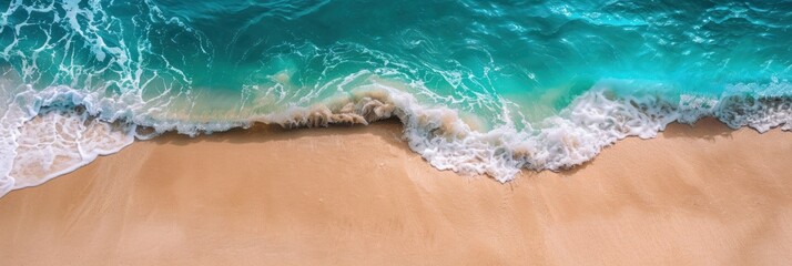 Beautiful sandy beach and soft blue ocean wave from top view