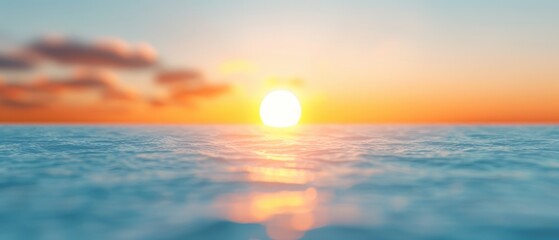  The sun sets over the ocean, viewed from the water's edge, with the horizon in the foreground