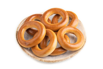 Homemade Ring Bagel isolated on white, side view.
