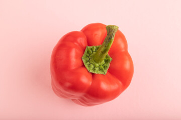 Red pepper on pink pastel, Top view, copy space.