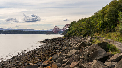 The River Forth and the Forth Bridge, seen from Inverkeithing Beach, Scotland, UK