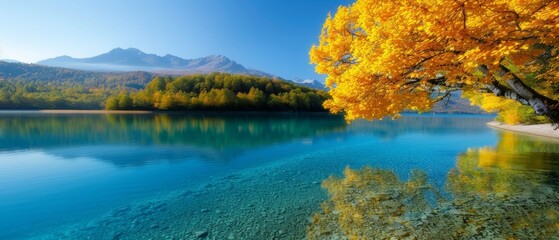  A body of water encircled by trees shedding yellow leaves, topped and bottomed, against a backdrop of distant mountain ranges