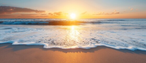 Obraz premium The sun sets over the ocean, a wave approaches the shore, and a rock juts from the water