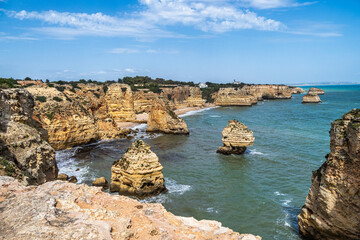 Praia da Marinha Beach among rock islets and cliffs seen from Seven Hanging Valleys Trail, Algarve, Portugal
