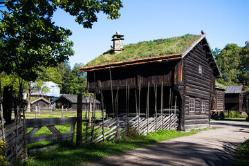 NORSK FOLKEMUSEUM, BYGDØY, OLSO, NORWAY - SEPTEMBER 15, 2014: Building with moss covered roof at...