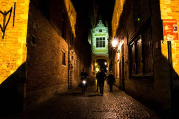 BRUGES, BELGIUM - SEPTEMBER 20, 2014: Alley in the beautiful city of Bruges at night. 