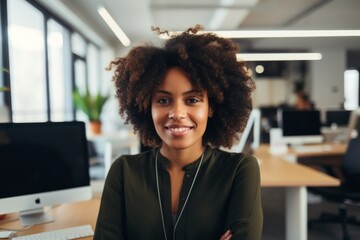 Smiling portrait of a young hipster woman in office