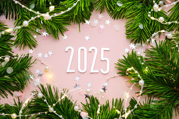 New Year 2025 pink background. Number of the coming year in Christmas decoration.