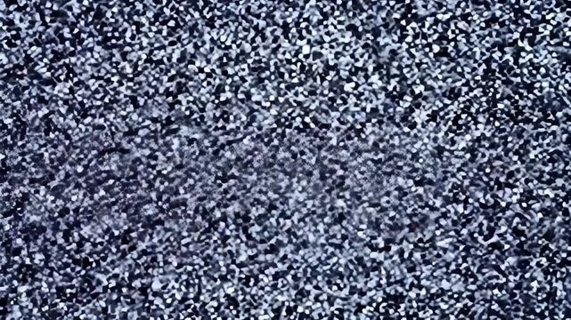 video featuring static noise or "snow" on screen, representing an untuned television channel. The flickering black and white dots create a nostalgic or unsettling effect, often associated with old TV