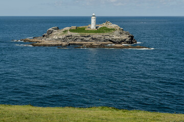 Godrevy Lighthouse was built in 1858–1859 on Godrevy Island in St Ives Bay, Cornwall.