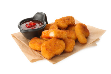 Hot chili sauce and pile of nuggets isolated on white