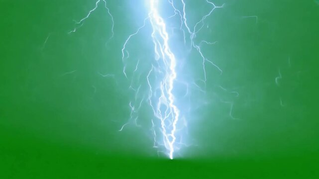 Dramatic lightning strikes over a green landscape during an intense storm in late afternoon
