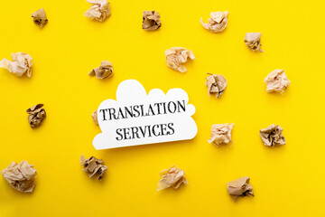 Translation services are written on a white piece of paper