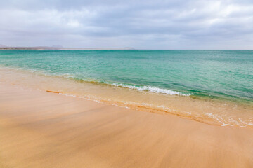 beach with sky and clouds