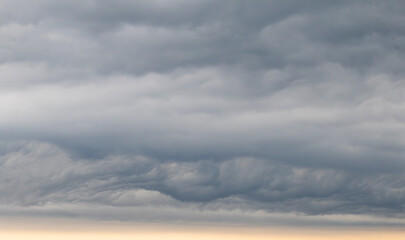 Obraz premium Sky replacement rolling gray and white dramatic storm clouds over horizon 5